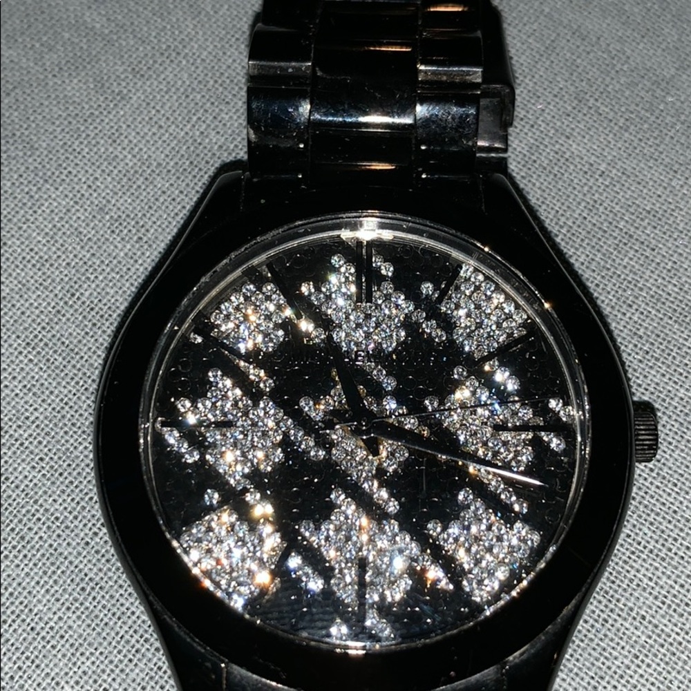 Michel Kors Black and Silver interior watch.